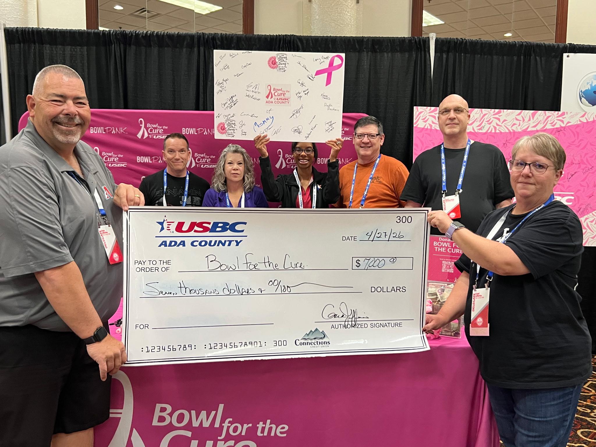 Ada County USBC presenting a $7,000 Bowl for the Cure contribution in 2026